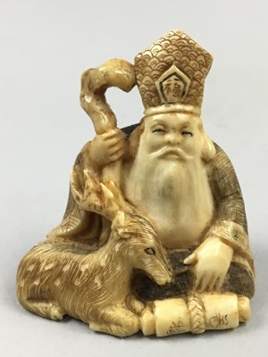 Lot 344 - A JAPANESE IVORY NETSUKE