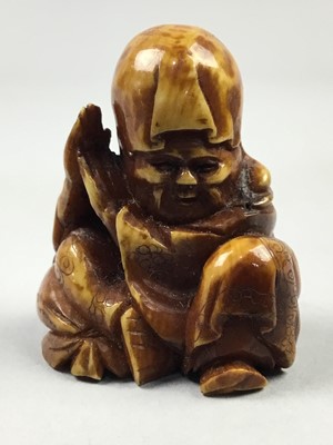 Lot 345 - A JAPANESE IVORY NETSUKE