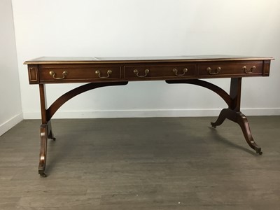 Lot 391 - A REPRODUCTION LIBRARY TABLE, ARM CHAIR AND TABLE LAMP