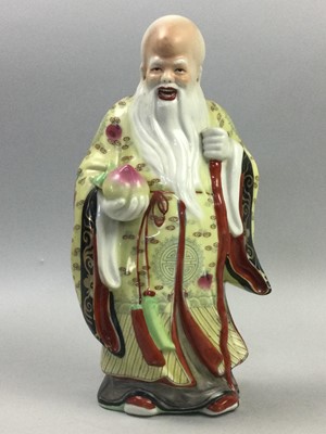 Lot 88 - A GROUP OF FOUR CHINESE CERAMIC BUDHAI AND A FIGURE OF SHOU LAO