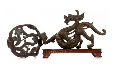Lot 411 - A CHINESE BRONZE CHILONG ALONG WITH A BRONZED STAND