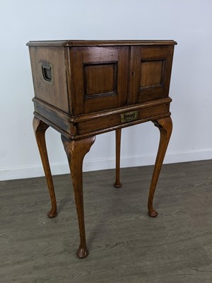 Lot 241 - AN EARLY 20TH CENTURY OAK TABLE CANTEEN