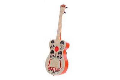 Lot 983 - A BEATLES NEW SOUND TOY GUITAR BY SELCOL