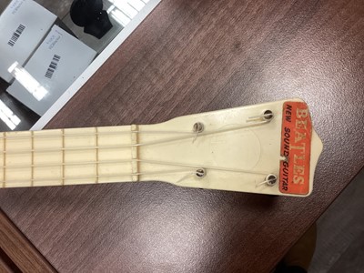 Lot 983 - A BEATLES NEW SOUND TOY GUITAR BY SELCOL