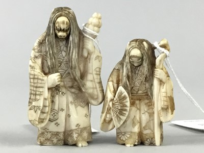 Lot 12 - A LOT OF TWO JAPANESE CARVED IVORY DOUBLE FACED KIJO/ ONIBABA FIGURAL NETSUKE