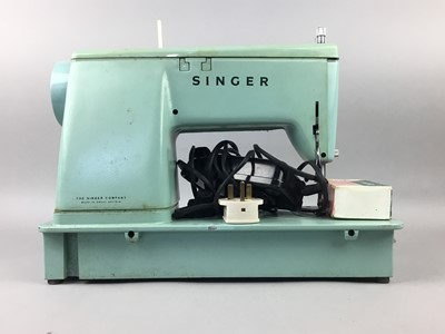 Lot 267 - A CASED SINGER SEWING MACHINE