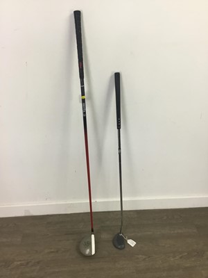 Lot 1575 - A JOHN DALY SIGNED DRIVER, ALONG WITH A PUTTER