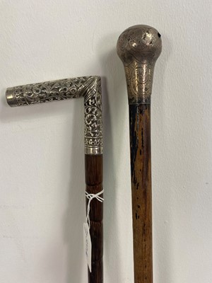 Lot 300A - A LOT OF TWO WALKING CANES, A PARASOL AND TWO UMBRELLAS