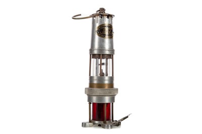 Lot 624 - A MINER'S SPIRALARM SAFETY LAMP BY J.H. NAYLOR OF WIGAN