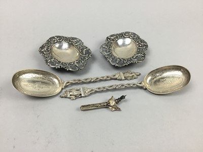 Lot 67 - TWO BURMESE WHITE METAL SHAPED PIN DISHES, METAL SPOONS AND A BROOCH