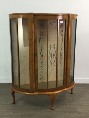 Lot 487 - A WALNUT DISPLAY CABINET