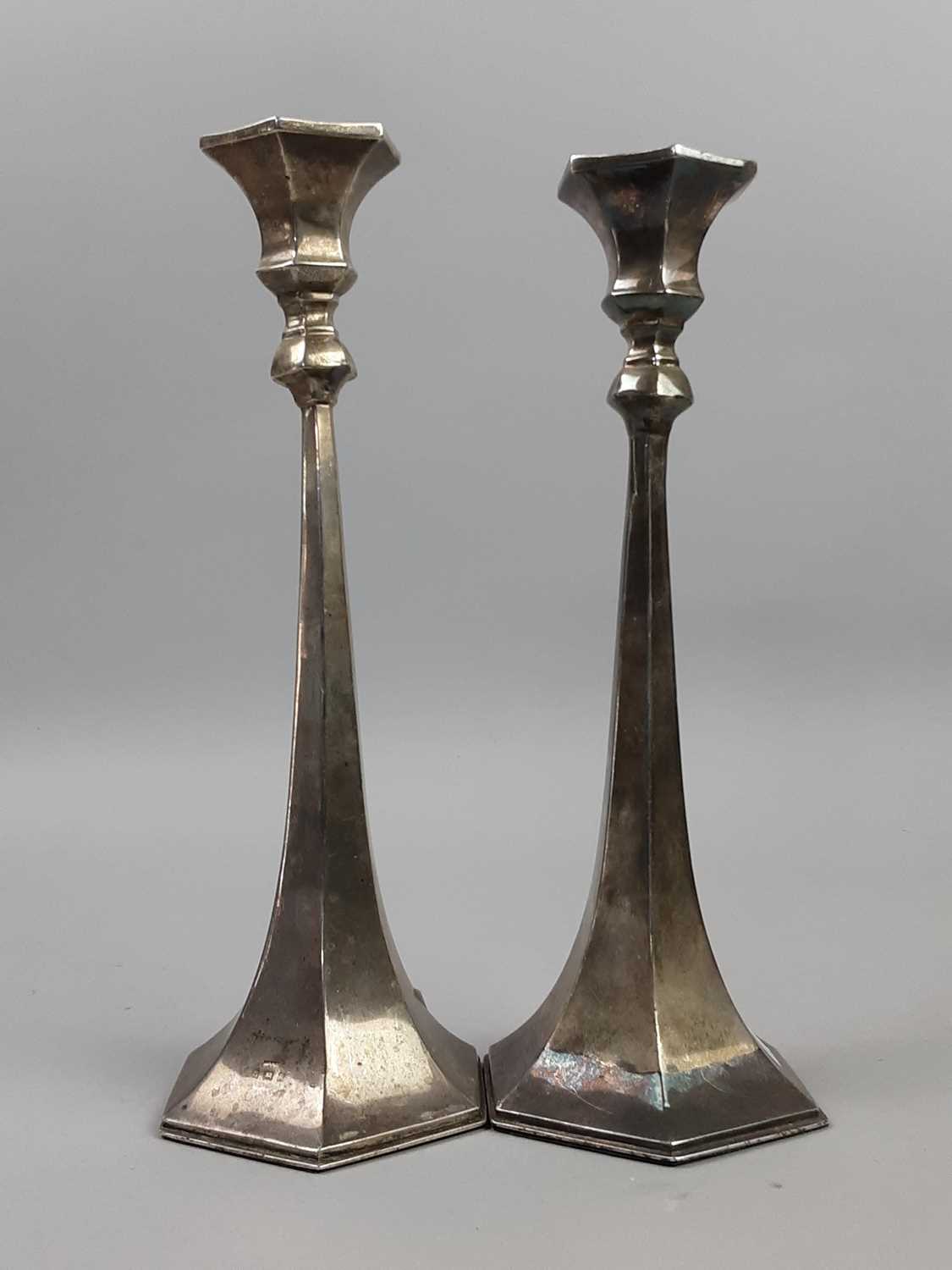 Lot 27 - A PAIR OF TAPERED SILVER CANDLESTICKS AND ANOTHER PAIR