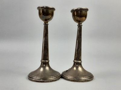 Lot 27 - A PAIR OF TAPERED SILVER CANDLESTICKS AND ANOTHER PAIR