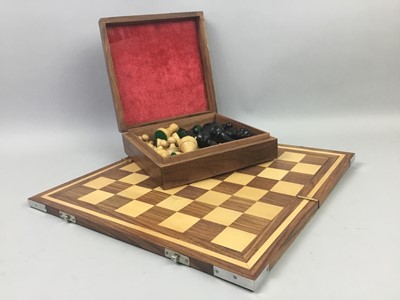 Lot 116 - A WOODEN CHESS BOARD AND PIECES