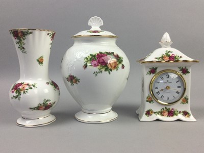Lot 98 - A ROYAL ALBERT OLD COUNTRY ROSES TELEPHONE, CLOCK, VASE AND A JAR WITH COVER