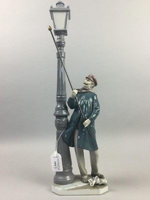 Lot 104 - A LLADRO FIGURE OF A LAMPLIGHTER AND TWO OTHER FIGURES