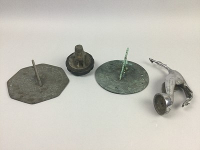 Lot 46 - A PATENATED CAST METAL SUNDIAL, TWO OTHER SUNDIALS AND TWO MASCOTS