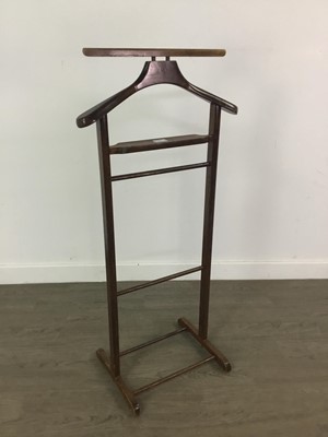 Lot 216 - A MAHOGANY FOLDING TEA TABLE, BEECH VALET STAND AND A PIANO STOOL