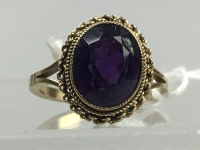 Lot 223 - AN AMETHYST DRESS RING