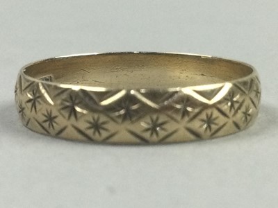 Lot 246 - A NINE CARAT GOLD WEDDING RING