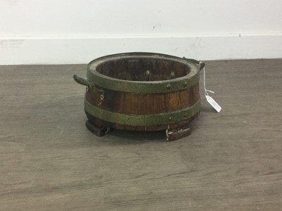 Lot 309 - A BRASS BOUND PLANTER