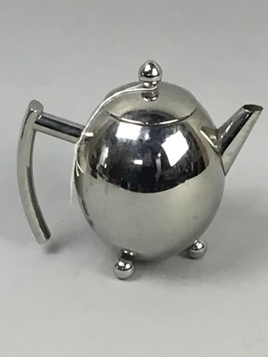 Lot 117 - A MODERNIST PLATED TEA POT