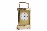 Lot 2 - BRASS CARRIAGE CLOCK BY HENLEY of serpentine...