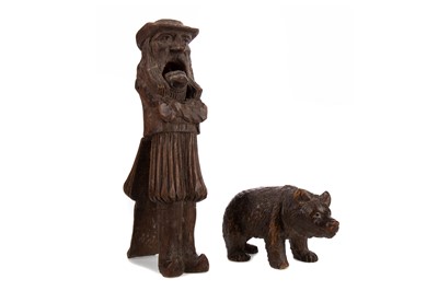 Lot 725 - A 19TH CENTURY TREEN NUT CRACKER AND A CARVING OF A BEAR