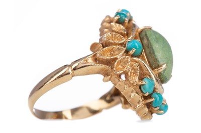 Lot 1175 - A TURQUOISE RING