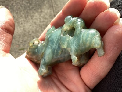 Lot 1053 - CHINESE DARK CELADON JADE CARVING OF A WATER BUFFALO AND YOUNG