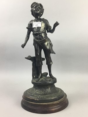 Lot 419 - A VICTORIAN CAST METAL DOORSTOP AND A BRONZED FIGURE OF A BOY