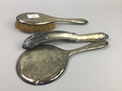 Lot 433 - A SILVER BACKED DRESSING TABLE SET AND A PLATED CRUMB BRUSH