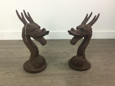 Lot 434 - A PAIR OF CAST IRON DRAGON FINIALS