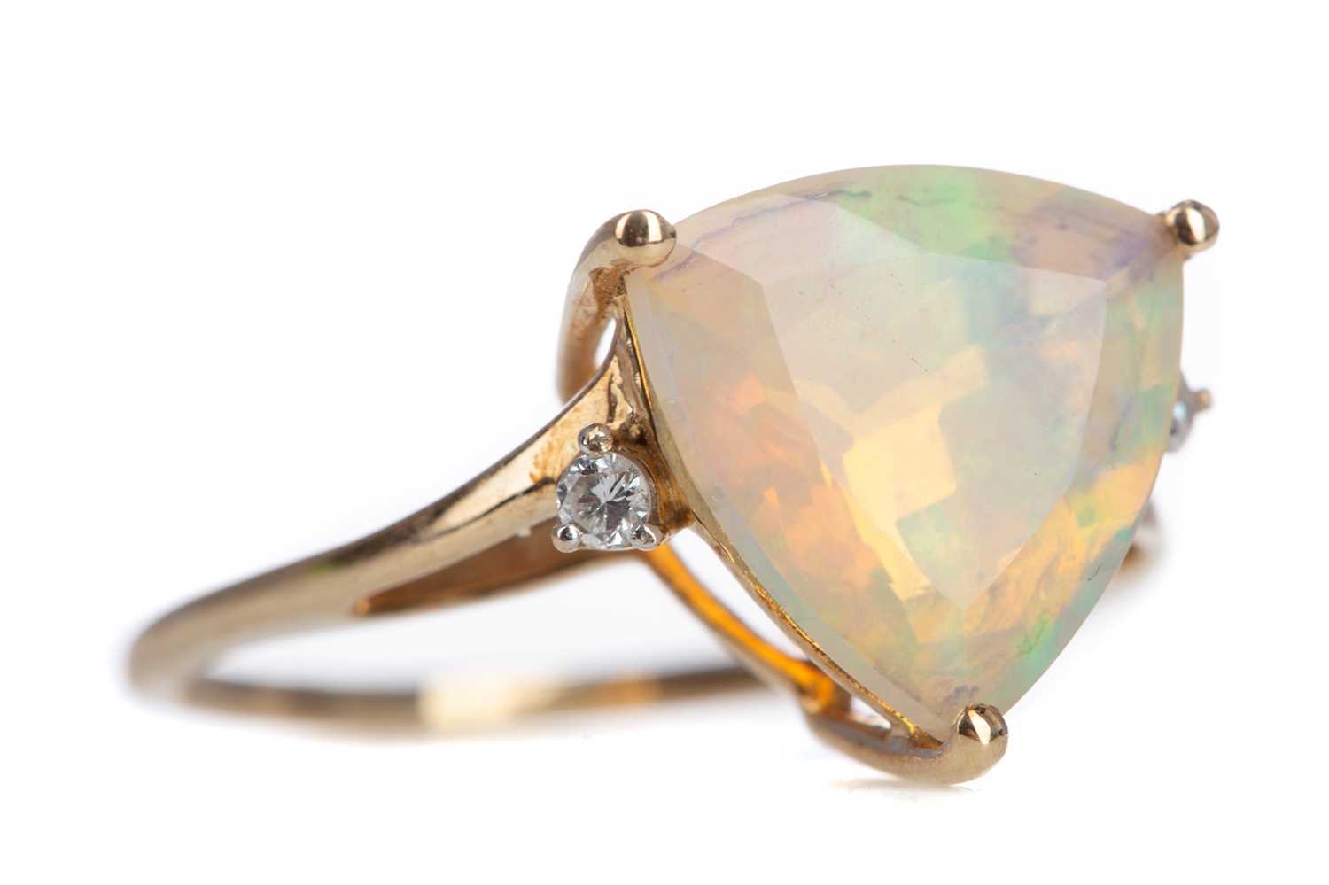 Lot 1113 - AN OPAL AND DIAMOND RING