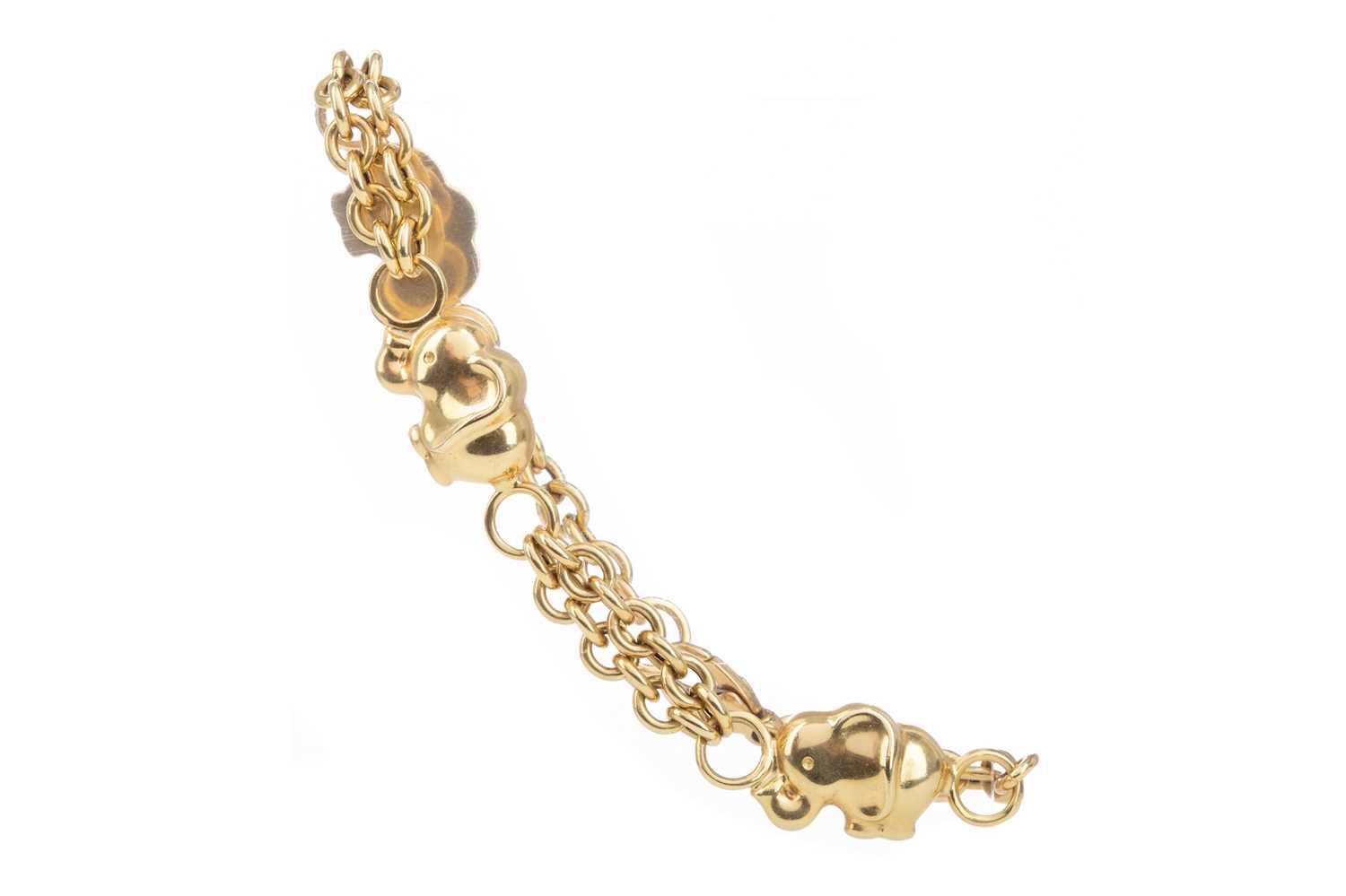Lot 1116 - A GOLD ELEPHANT BRACELET