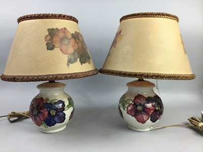Lot 526 - A PAIR OF MOORCROFT  'HIBISCUS' PATTERN TABLE LAMPS