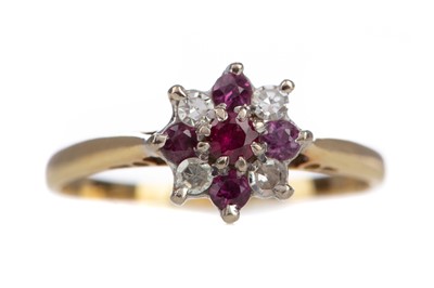 Lot 1121 - A RUBY AND DIAMOND CLUSTER RING