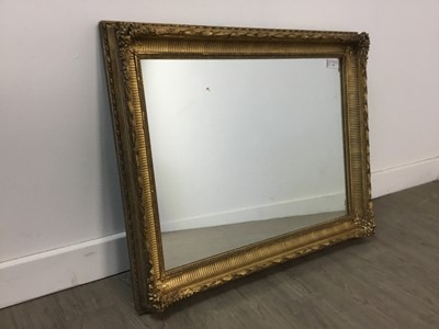 Lot 20 - A MOULDED GILT WOOD AND GESSO WALL MIRROR
