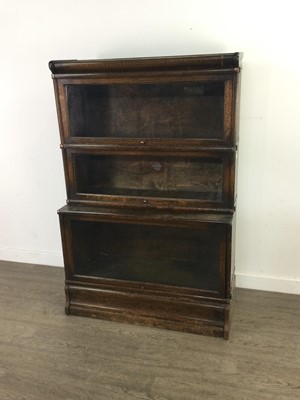 Lot 207 - AN EARLY 20TH CENTURY OAK STACKING BOOKCASE