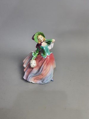 Lot 268 - A ROYAL DOULTON FIGURE OF 'AUTUMN BREEZES' AND THREE OTHER FIGURES
