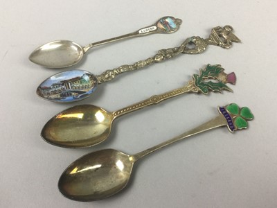 Lot 49 - A GROUP OF SILVER AND PLATED SOUVENIR SPOONS