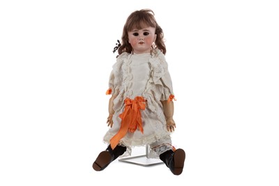 Lot 1143 - A JUMEAU BISQUE HEADED GIRL DOLL