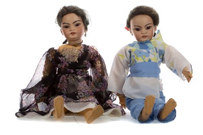 Lot 1146 - A BISQUE HEADED ORIENTAL GIRL DOLL