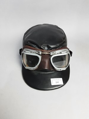 Lot 295 - A HELMET AND GOGGLES