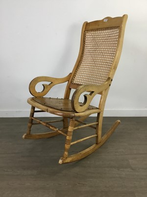 Lot 297 - A CANE BACK ROCKING CHAIR AND TWO ARMCHAIRS