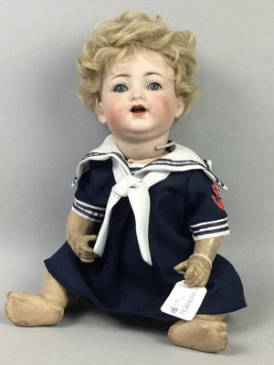 Lot 1160 - A BISQUE HEADED GIRL DOLL