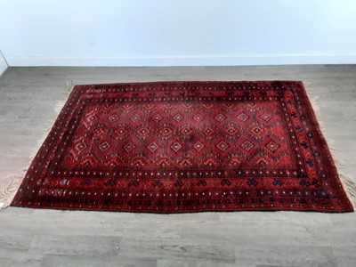 Lot 112 - A LOT OF THREE MIDDLE EASTERN RUGS