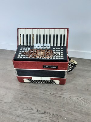 Lot 115 - A ROSSINI ACCORDION, A LAP HARP AND A METRONOME
