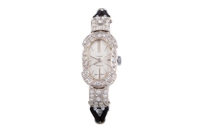 Lot 809 - A LADY'S INCABLOC PLATINUM AND DIAMOND MANUAL WIND COCKTAIL WATCH