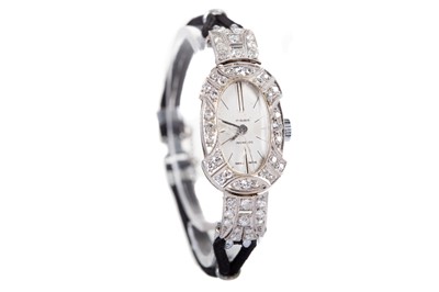 Lot 809 - A LADY'S INCABLOC PLATINUM AND DIAMOND MANUAL WIND COCKTAIL WATCH